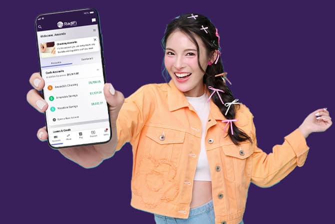 Teen holding phone with online banking on the screen.