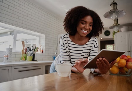 Woman planning for home renovations using a RadiFi Credit Union Home Equity Line of Credit.
